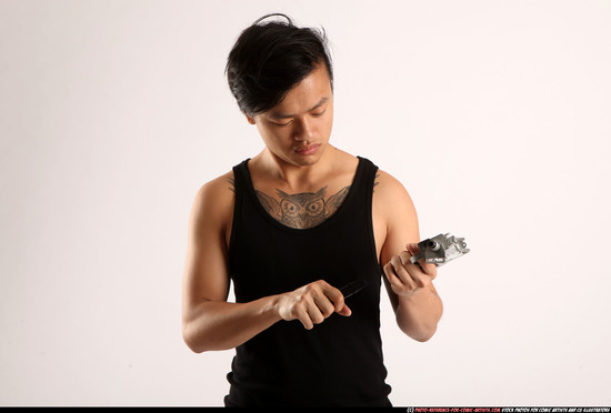 Man Young Athletic Reloading weapon Detailed photos Casual Asian