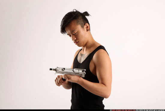 Man Young Athletic Reloading weapon Detailed photos Casual Asian