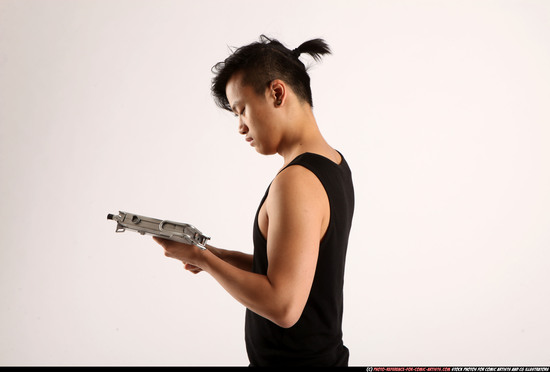 Man Young Athletic Reloading weapon Detailed photos Casual Asian