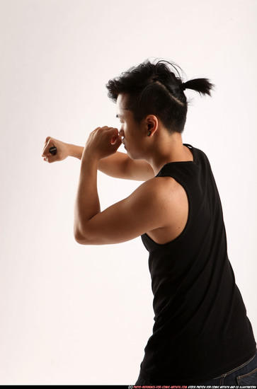 Man Young Athletic Fighting with knife Standing poses Casual Asian