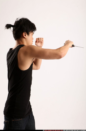 Man Young Athletic Fighting with knife Standing poses Casual Asian