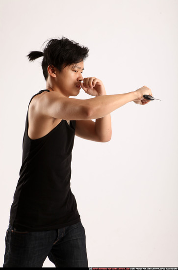 Man Young Athletic Fighting with knife Standing poses Casual Asian