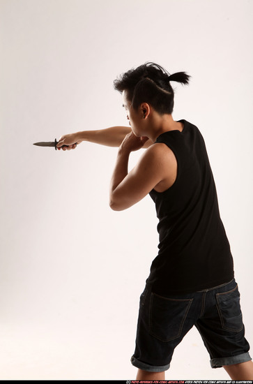 Man Young Athletic Fighting with knife Standing poses Casual Asian