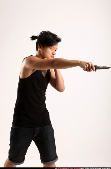 Man Young Athletic Fighting with knife Standing poses Casual Asian