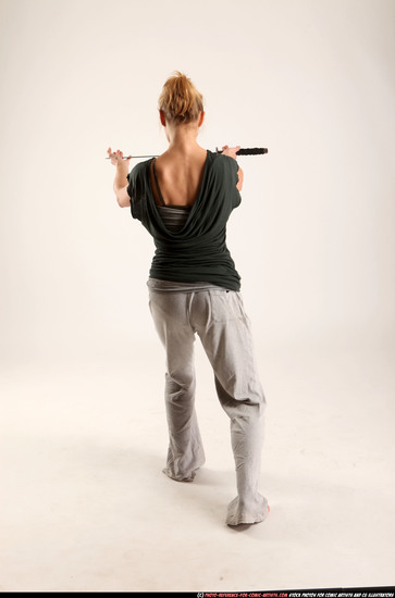 Woman Adult Athletic White Fighting with sword Standing poses Casual