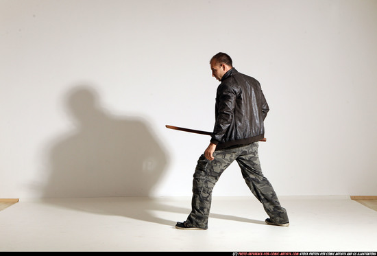 Man Adult Athletic White Fighting with sword Moving poses Casual