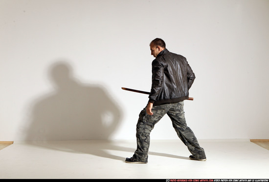 Man Adult Athletic White Fighting with sword Moving poses Casual