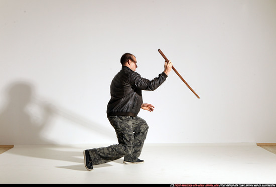 Man Adult Athletic White Fighting with sword Moving poses Casual