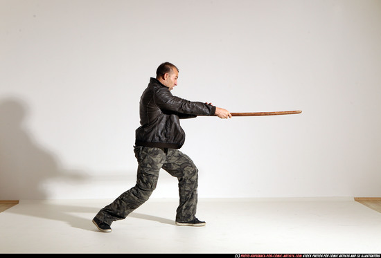 Man Adult Athletic White Fighting with sword Moving poses Casual