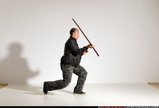 Man Adult Athletic White Fighting with sword Moving poses Casual