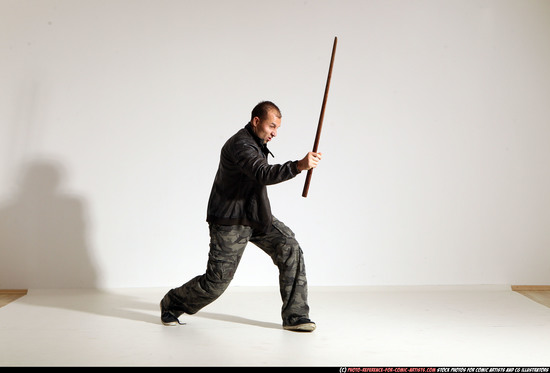 Man Adult Athletic White Fighting with sword Moving poses Casual