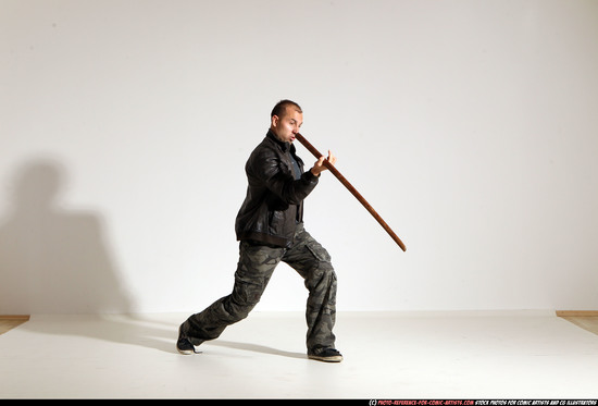 Man Adult Athletic White Fighting with sword Moving poses Casual