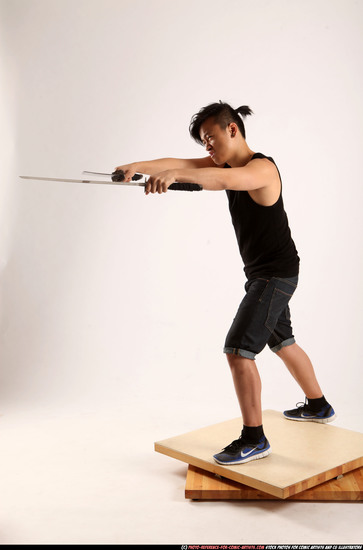 Man Young Athletic Fighting with sword Standing poses Casual Asian