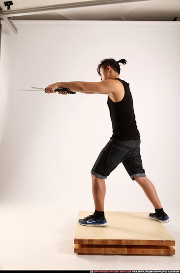 Man Young Athletic Fighting with sword Standing poses Casual Asian