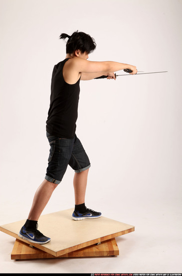 Man Young Athletic Fighting with sword Standing poses Casual Asian