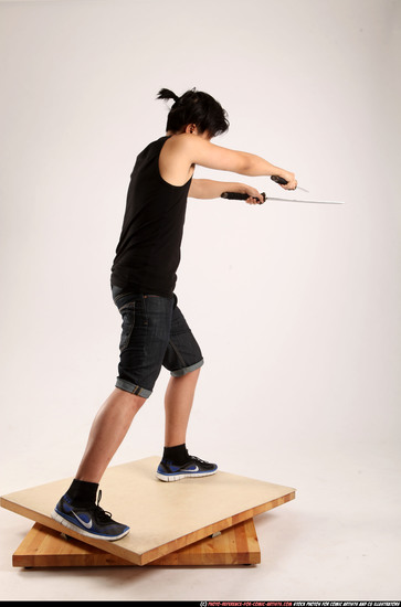 Man Young Athletic Fighting with sword Standing poses Casual Asian