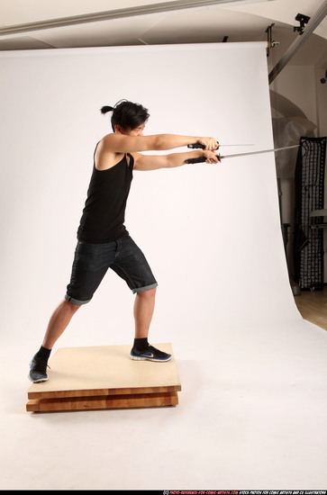 Man Young Athletic Fighting with sword Standing poses Casual Asian