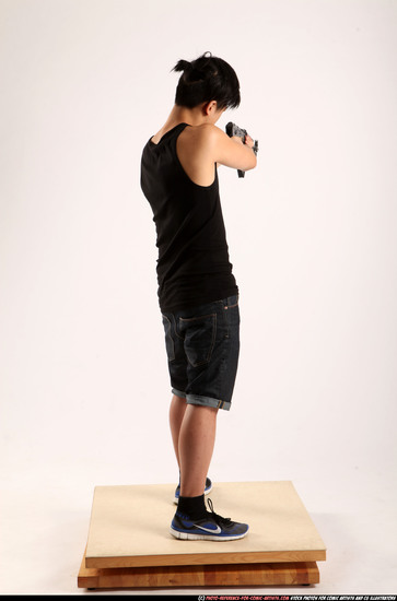 Man Young Athletic Fighting with submachine gun Standing poses Casual Asian