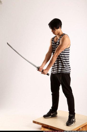 Man Young Athletic Fighting with sword Standing poses Casual Asian