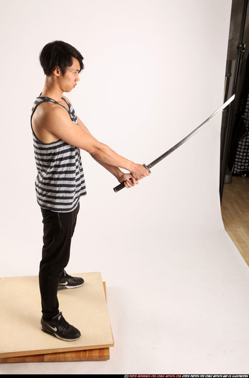 Man Young Athletic Fighting with sword Standing poses Casual Asian