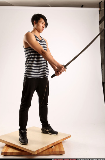 Man Young Athletic Fighting with sword Standing poses Casual Asian