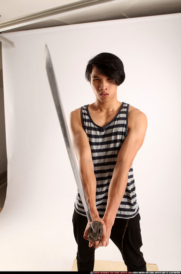 Man Young Athletic Fighting with sword Standing poses Casual Asian