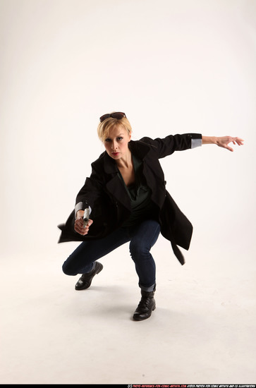 Woman Adult Athletic White Fighting with gun Kneeling poses Coat