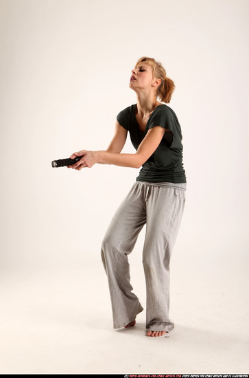 Woman Adult Athletic White Fighting with sword Moving poses Casual