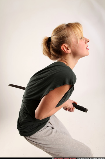 Woman Adult Athletic White Fighting with sword Moving poses Casual