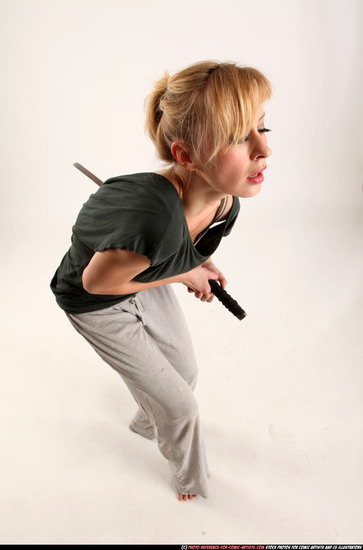 Woman Adult Athletic White Fighting with sword Moving poses Casual