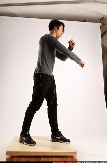 Man Young Athletic Fighting with knife Standing poses Casual Asian