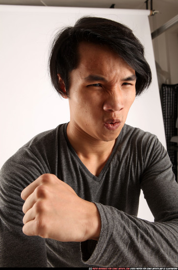 Man Young Athletic Fighting with knife Standing poses Casual Asian