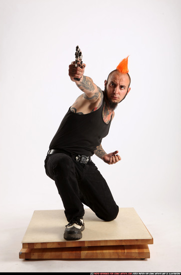 Man Adult Athletic White Fighting with gun Kneeling poses Casual