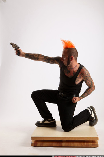 Man Adult Athletic White Fighting with gun Kneeling poses Casual