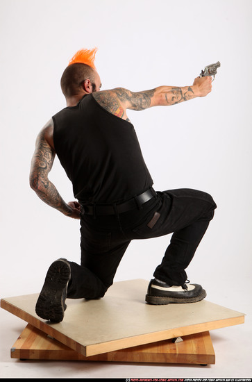 Man Adult Athletic White Fighting with gun Kneeling poses Casual