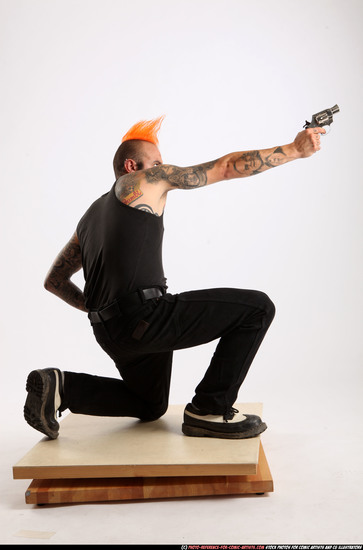 Man Adult Athletic White Fighting with gun Kneeling poses Casual