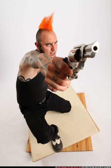 Man Adult Athletic White Fighting with gun Kneeling poses Casual