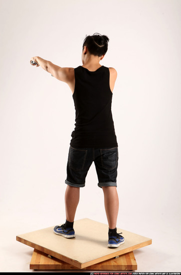 Man Young Athletic Fighting with gun Standing poses Casual Asian