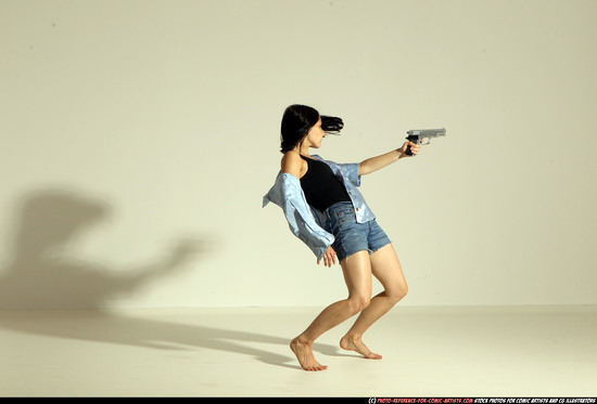 Woman Young Athletic White Fighting with gun Moving poses Casual