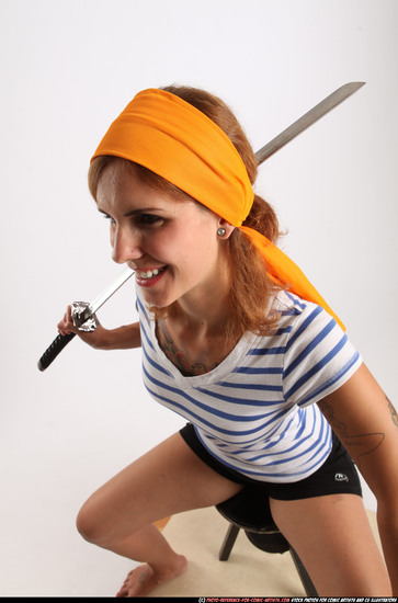 Woman Adult Athletic White Fighting with sword Sitting poses Army