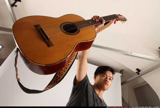 Man Young Athletic Holding Standing poses Casual Asian