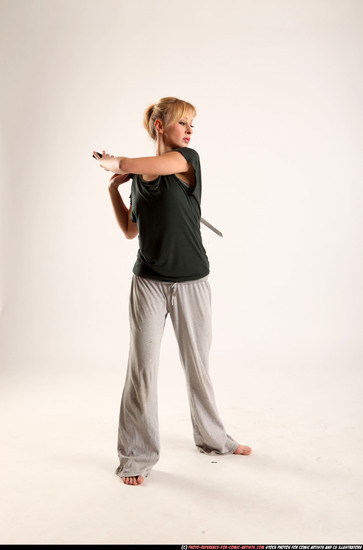 Woman Adult Athletic White Fighting with sword Standing poses Casual