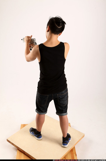 Man Young Athletic Fighting with submachine gun Standing poses Casual Asian