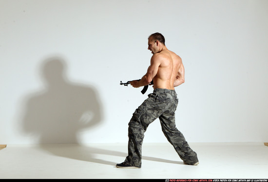 Man Adult Athletic White Fighting with submachine gun Moving poses Pants