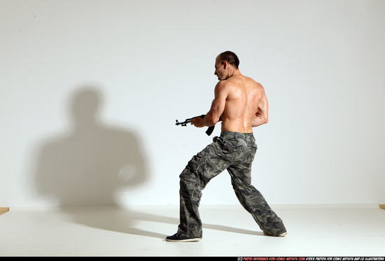 Man Adult Athletic White Fighting with submachine gun Moving poses Pants