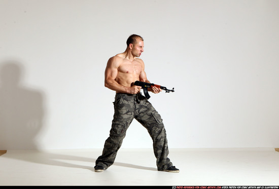 Man Adult Athletic White Fighting with submachine gun Moving poses Pants