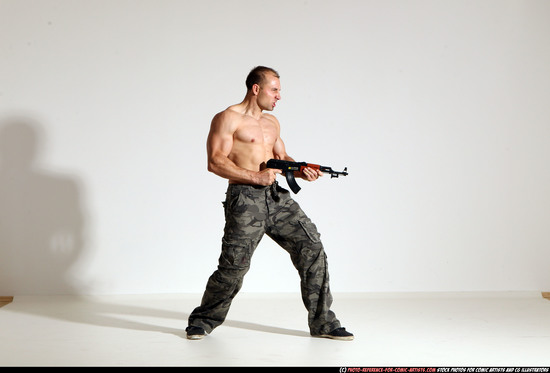 Man Adult Athletic White Fighting with submachine gun Moving poses Pants