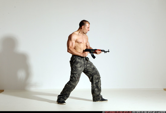 Man Adult Athletic White Fighting with submachine gun Moving poses Pants