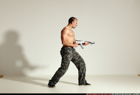 Man Adult Athletic White Fighting with submachine gun Moving poses Pants