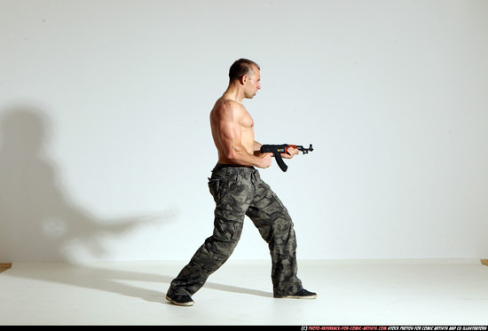 Man Adult Athletic White Fighting with submachine gun Moving poses Pants